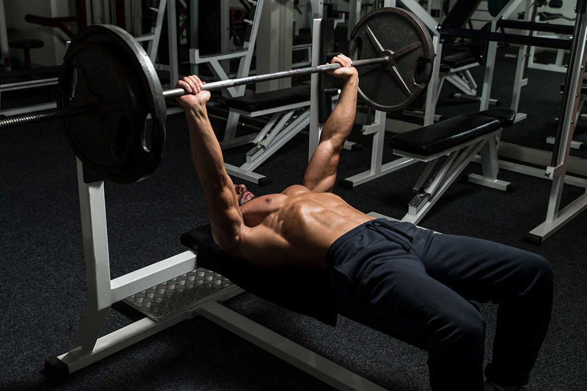 Mirafit-blog-on-how-to-get-stronger-image-of-man-doing-a-bench-press